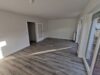 gute Rendite * provisionsfrei * vermietete DHH in ruhiger Lage mit Terrasse und Stellplatz - Wohnzimmer