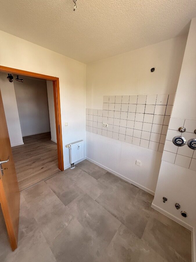 / 2-Raum Wohnung mit Balkon und TG-Stellplatz / ab 01.08.26 - Photo 4